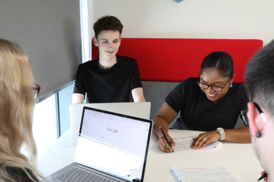 Meet compliance requirements with a pen test Team meeting